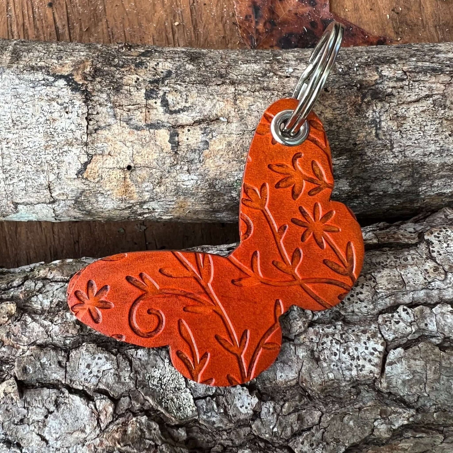embossed leather floral butterfly purse charm