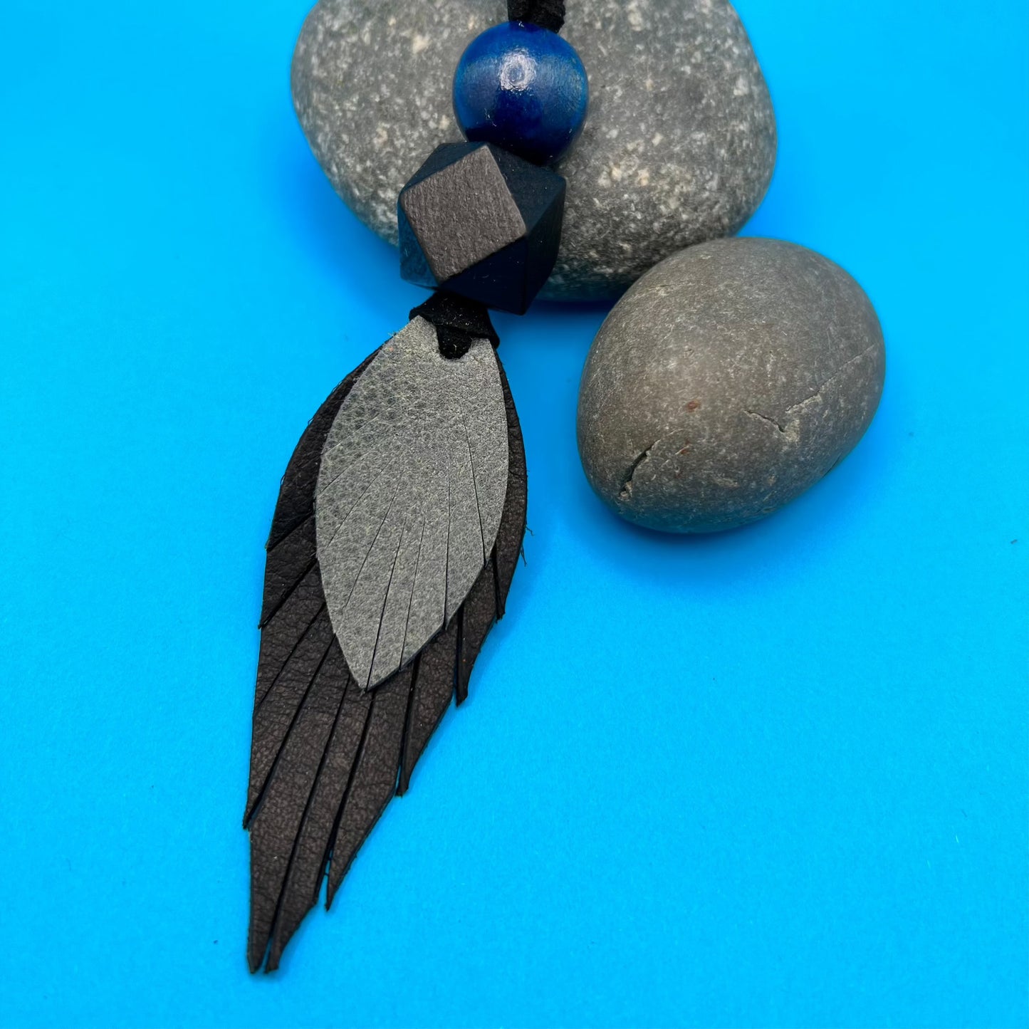 denim blue and black leather feather purse charm