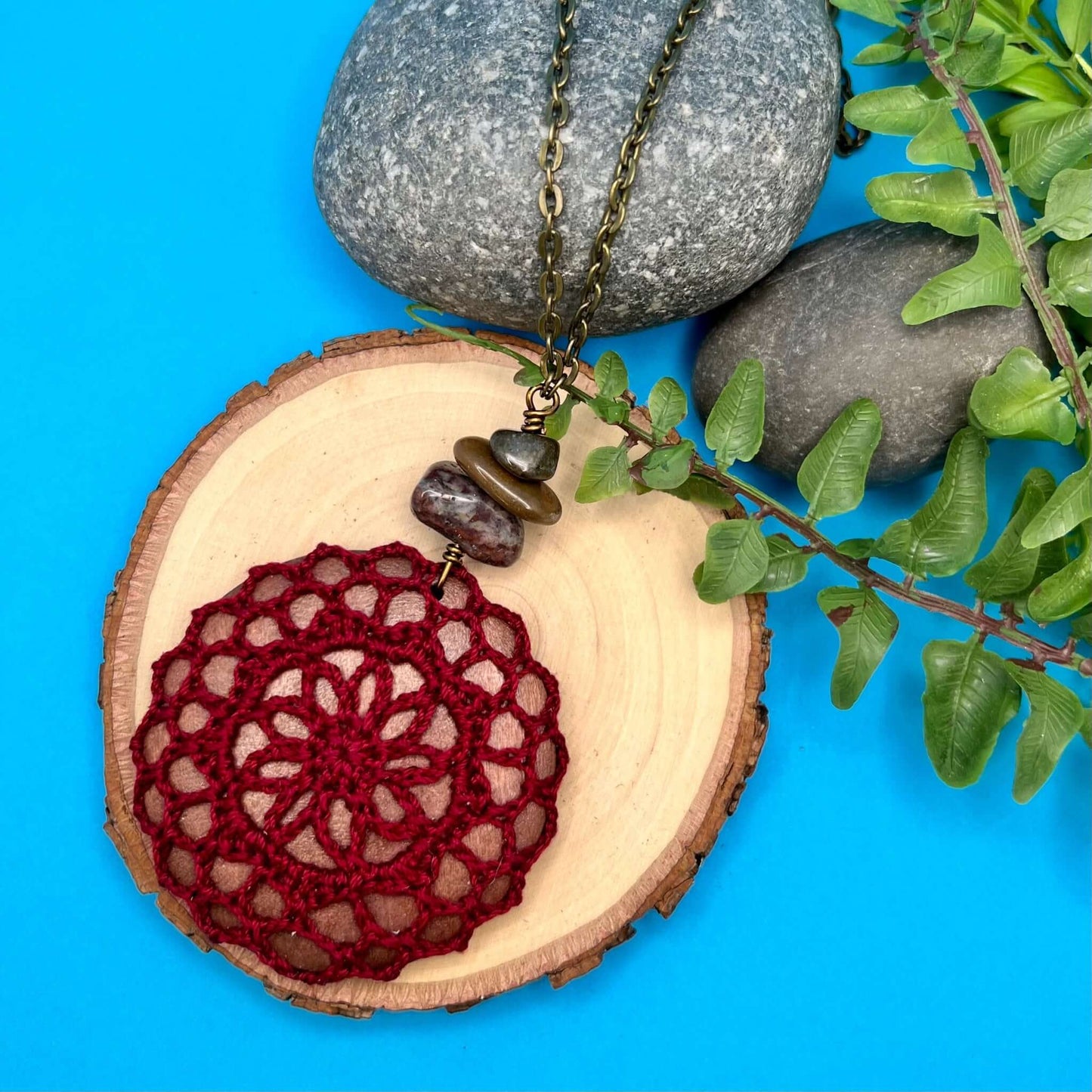 burgundy red crocheted pendant necklace on long chain