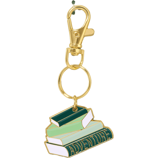 Keychain with book design and 'Adventure' text on a white background