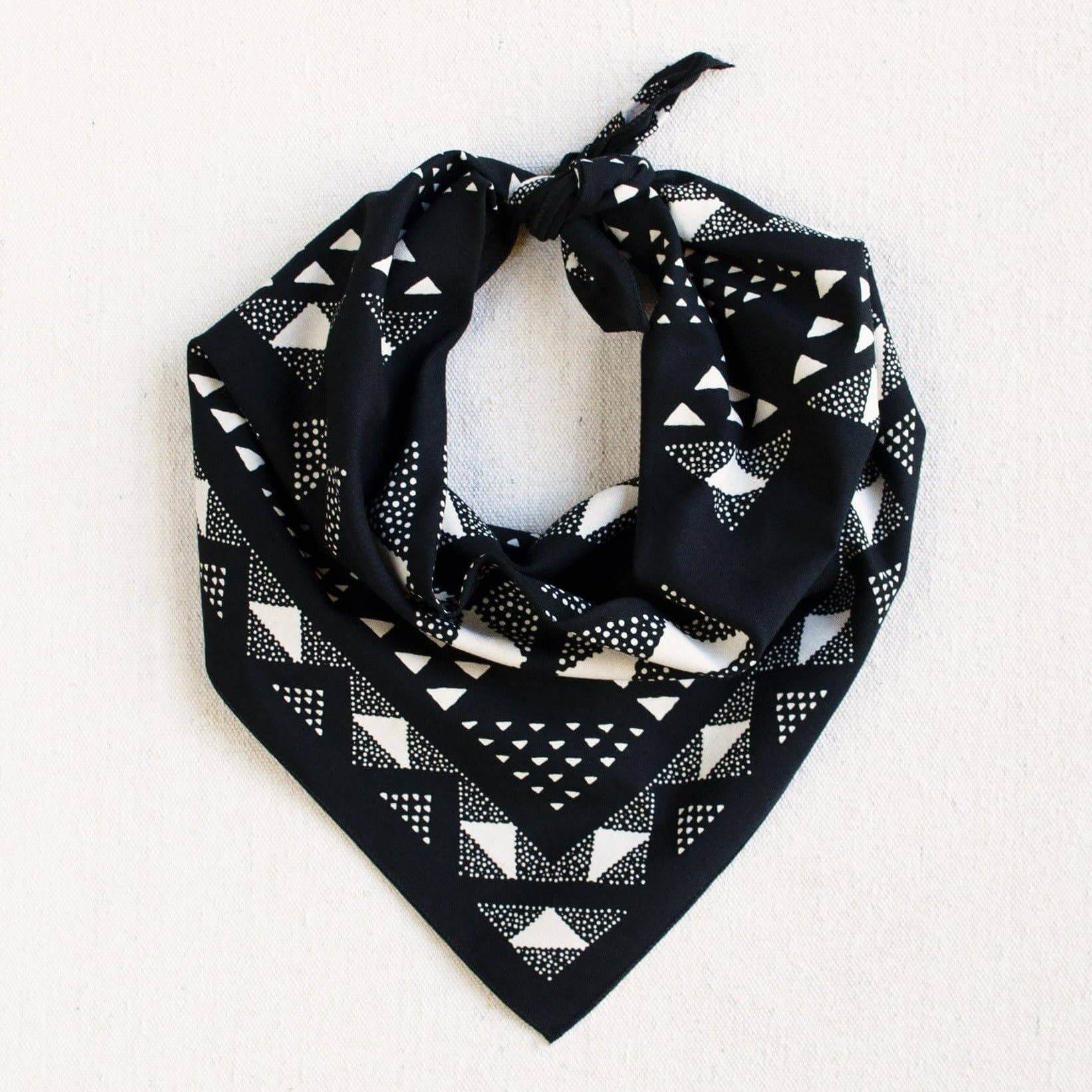 Black bandana with white geometric pattern on a white background
