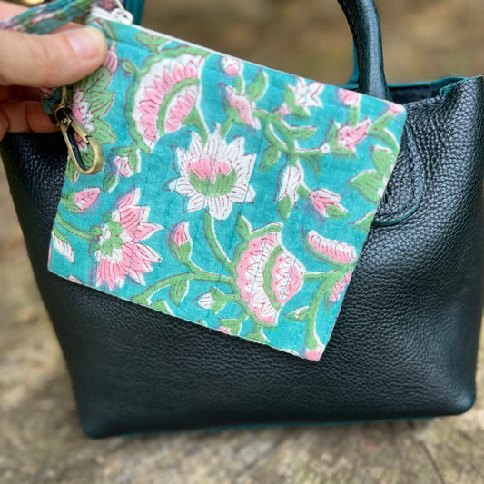 blue floral zipper pouch on boreal bag