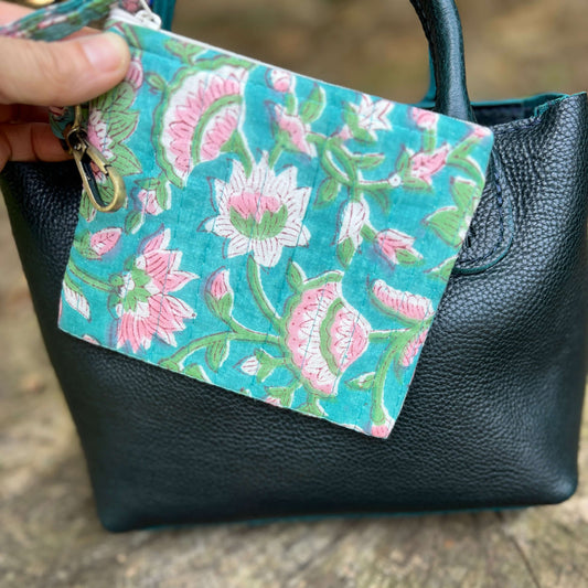 blue floral zipper pouch on boreal bag