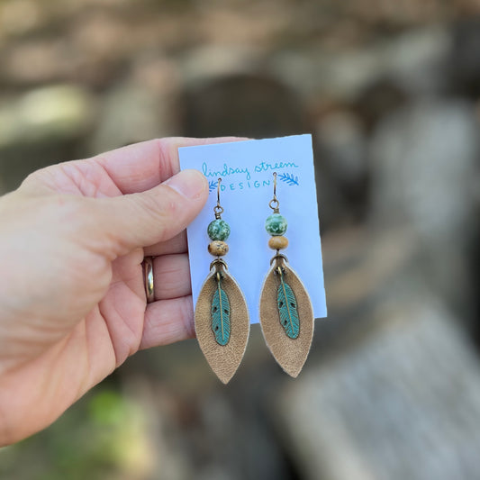 brown leather earrings with feather and green and brown jasper