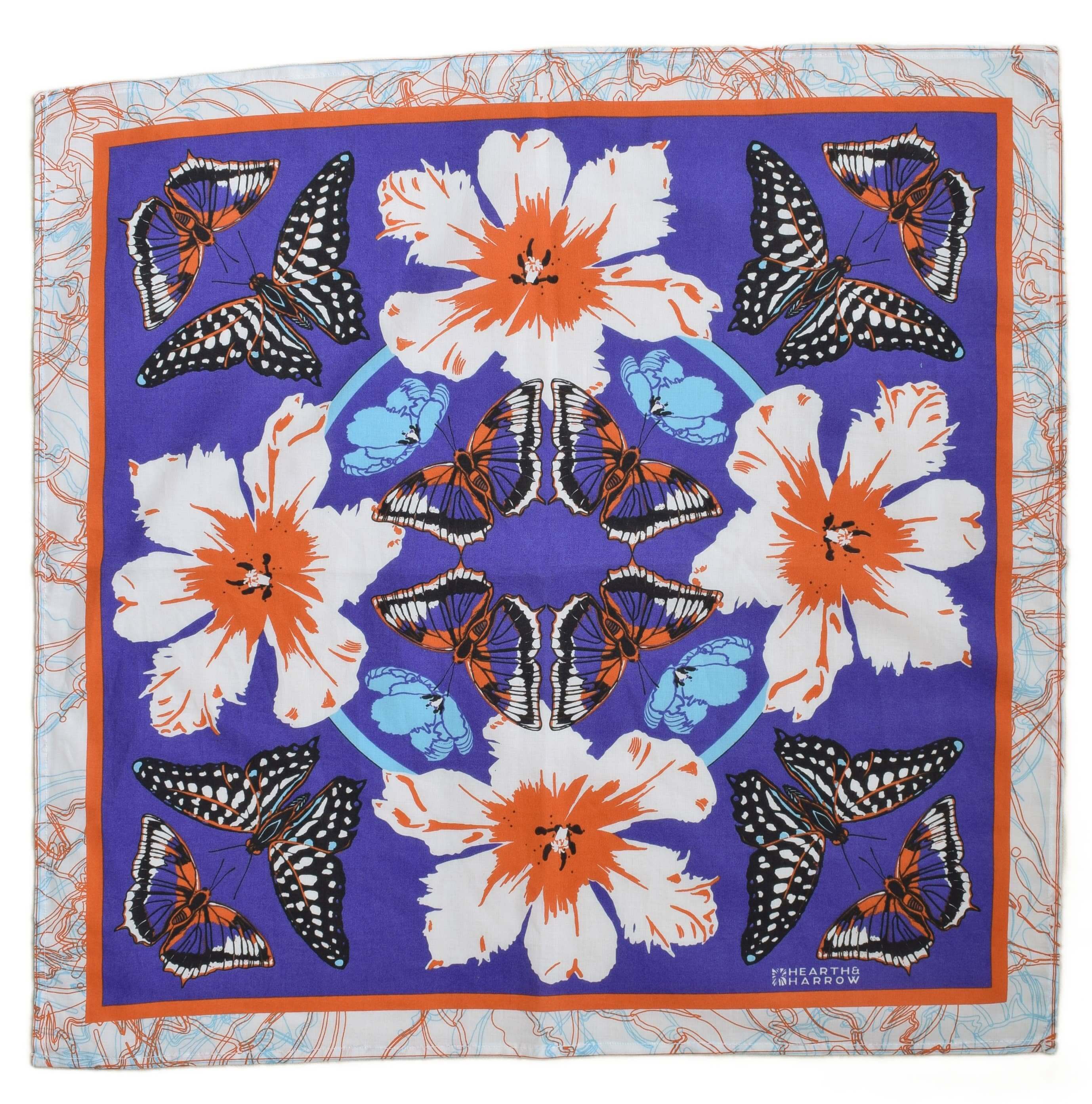 Scarf with floral and butterfly pattern on a purple background