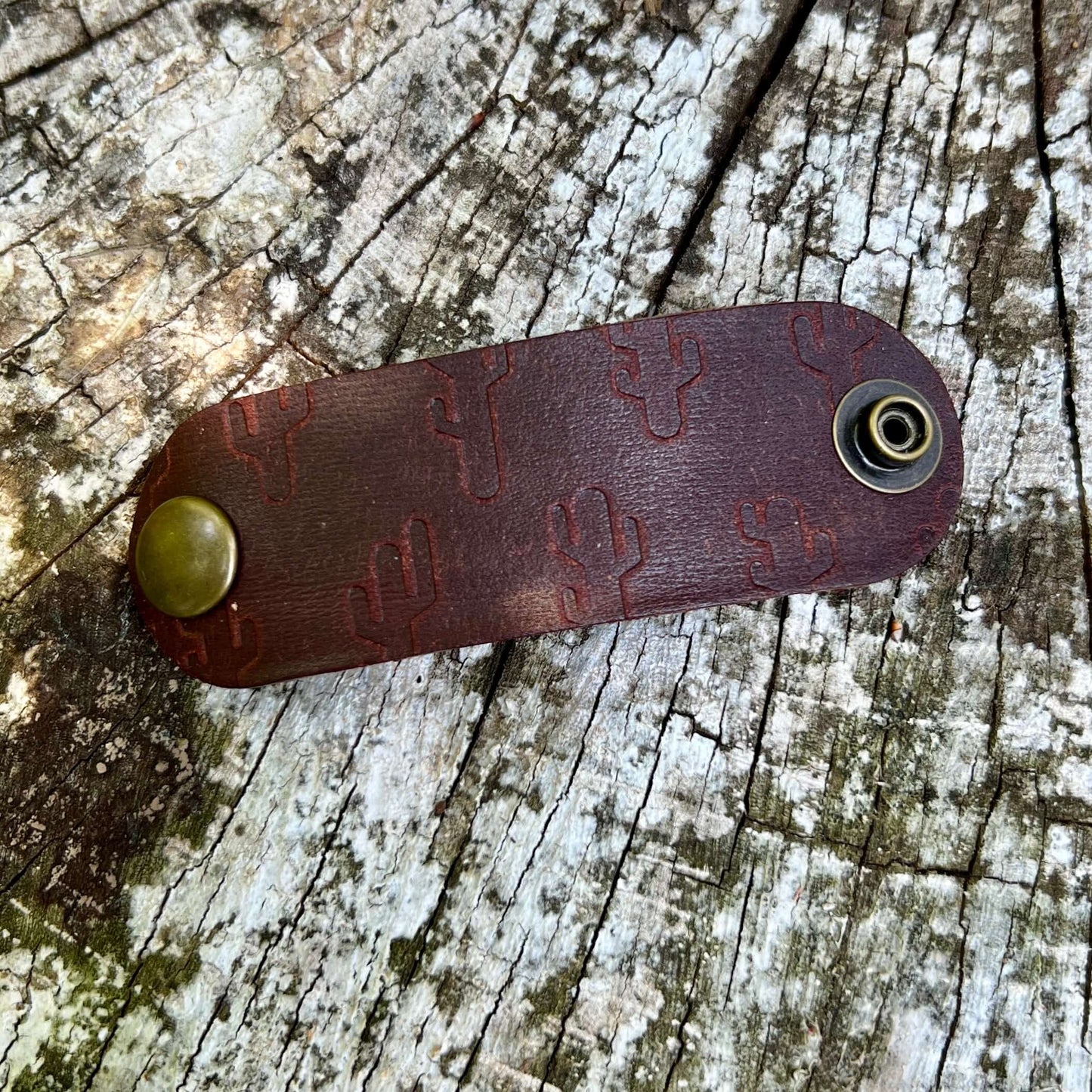 dark brown leather bandana slide with cactus print