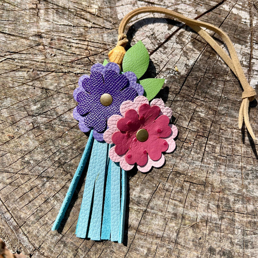 pink purple and blue leather flower purse charm with tassel