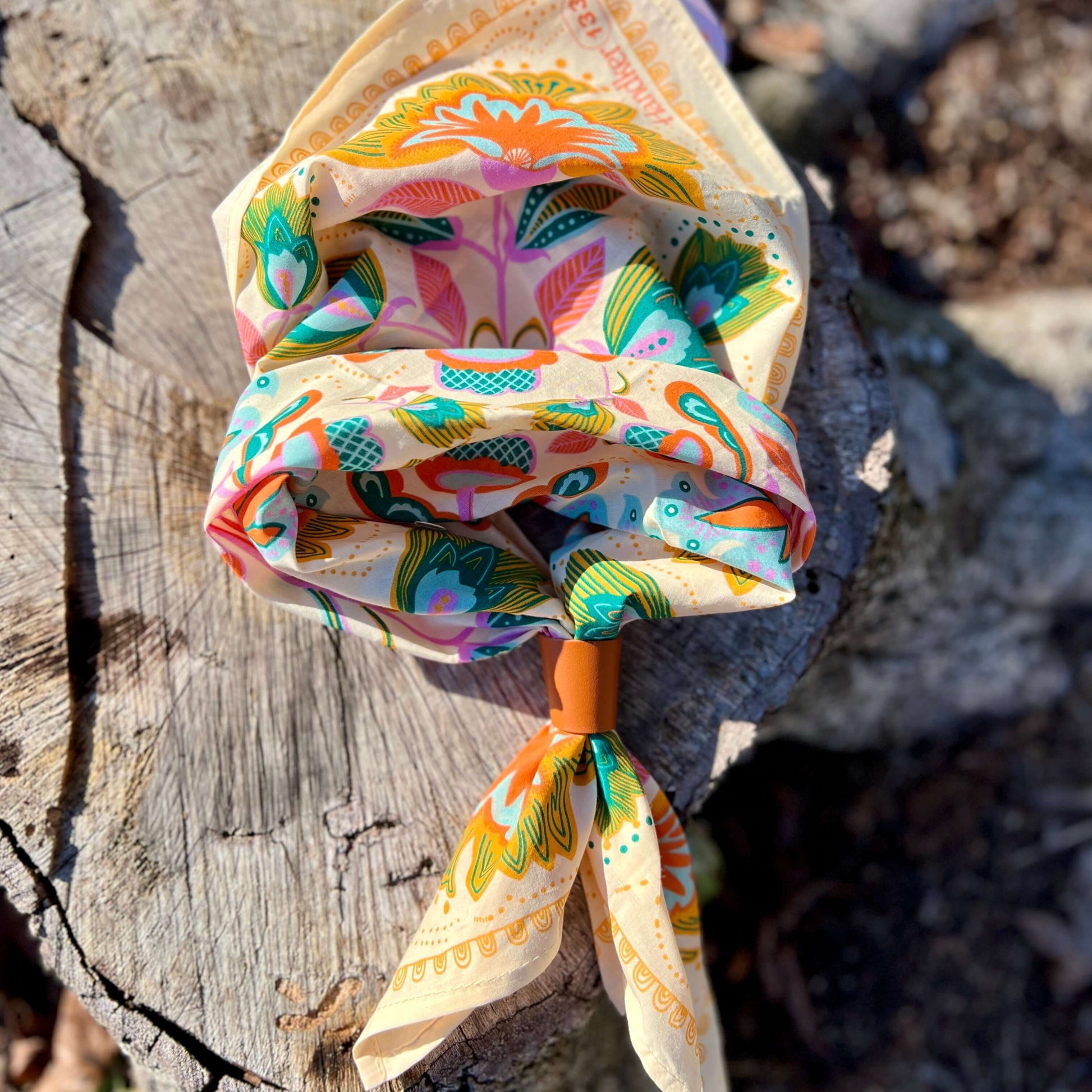 floral bandana with orange leather slide