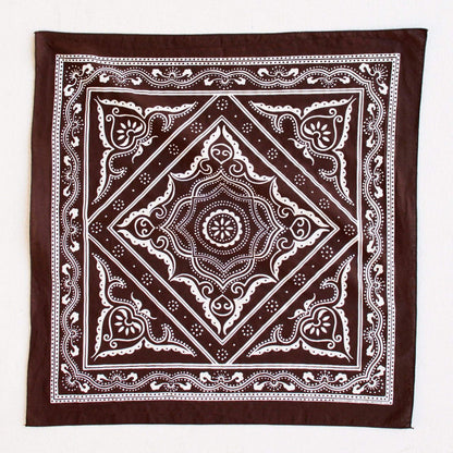 Brown bandana with white intricate patterns on a white background