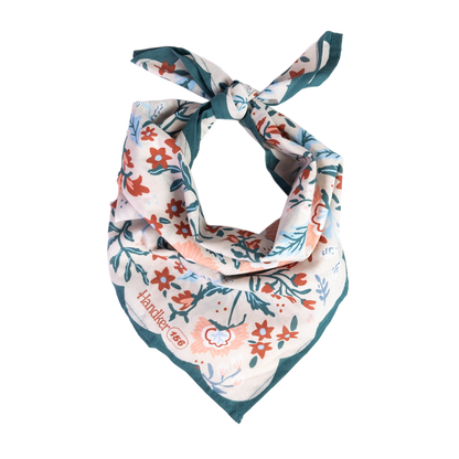Floral patterned bandana with a brand logo on a white background