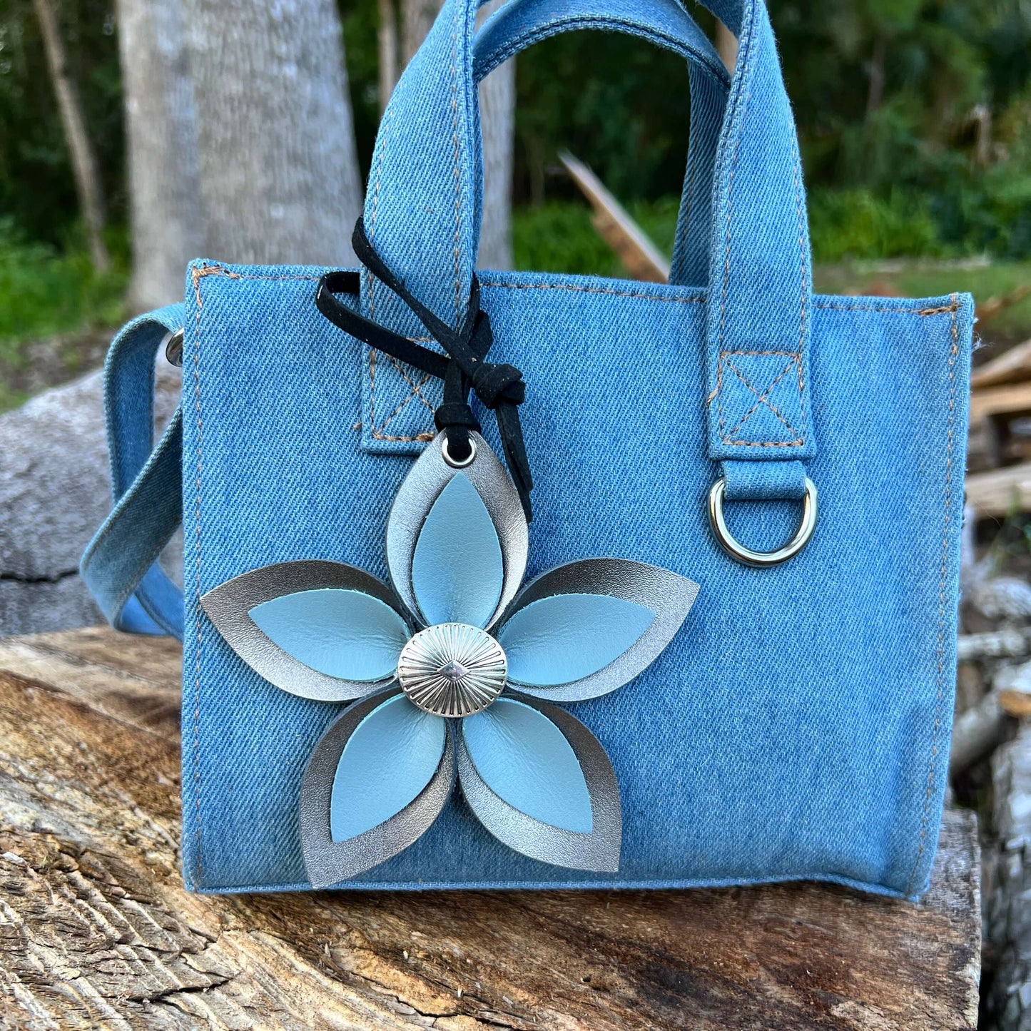 Leather Flower Bag Charm - Large Flower with Loop - Platinum Grey with Blue GreyLeather purse charms are a great way to update your handbag, purse or tote. Each flower is crafted with leather petals securely sewn and glued together and accented with butto