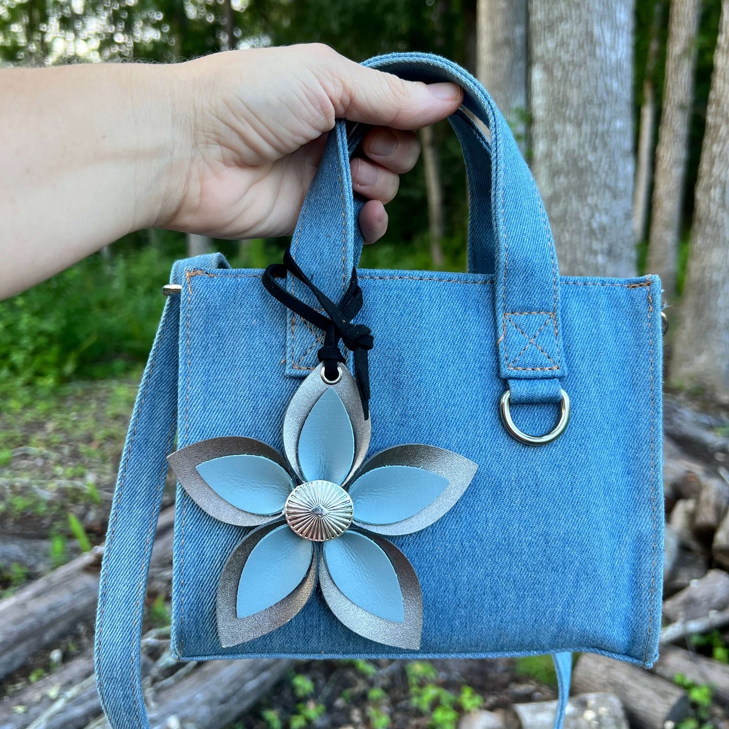 Leather Flower Bag Charm - Large Flower with Loop - Platinum Grey with Blue GreyLeather purse charms are a great way to update your handbag, purse or tote. Each flower is crafted with leather petals securely sewn and glued together and accented with butto