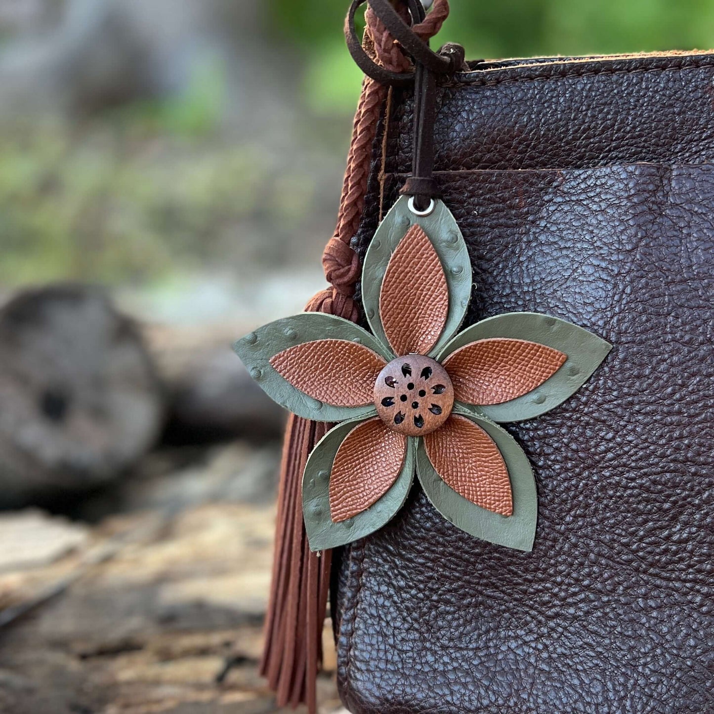 Leather Flower Bag Charm - Large Flower with Loop - Olive Green with BrownLeather purse charms are a great way to update your handbag, purse or tote. Each flower is crafted with leather petals securely sewn and glued together and accented with buttons in