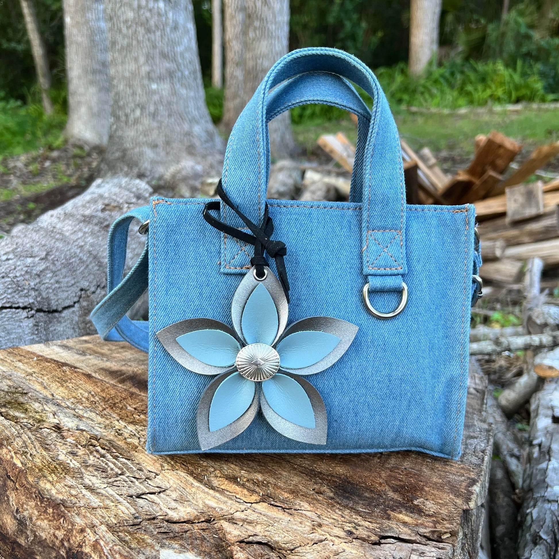 Leather Flower Bag Charm - Large Flower with Loop - Platinum Grey with Blue GreyLeather purse charms are a great way to update your handbag, purse or tote. Each flower is crafted with leather petals securely sewn and glued together and accented with butto