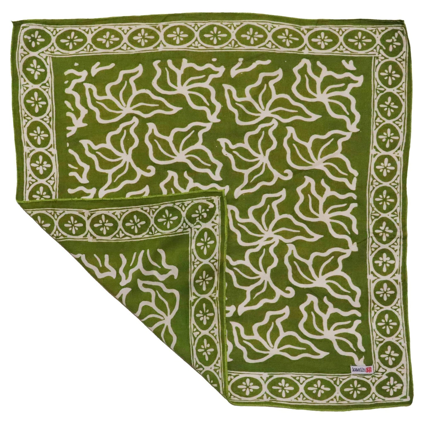 Green fabric with white floral pattern on a white background