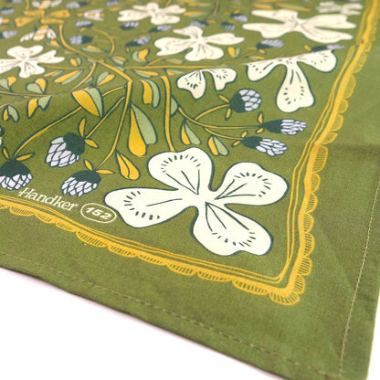 Green bandana with floral patterns and 'Handkerchief' text on a white background