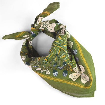 Green floral patterned bandana on a white background