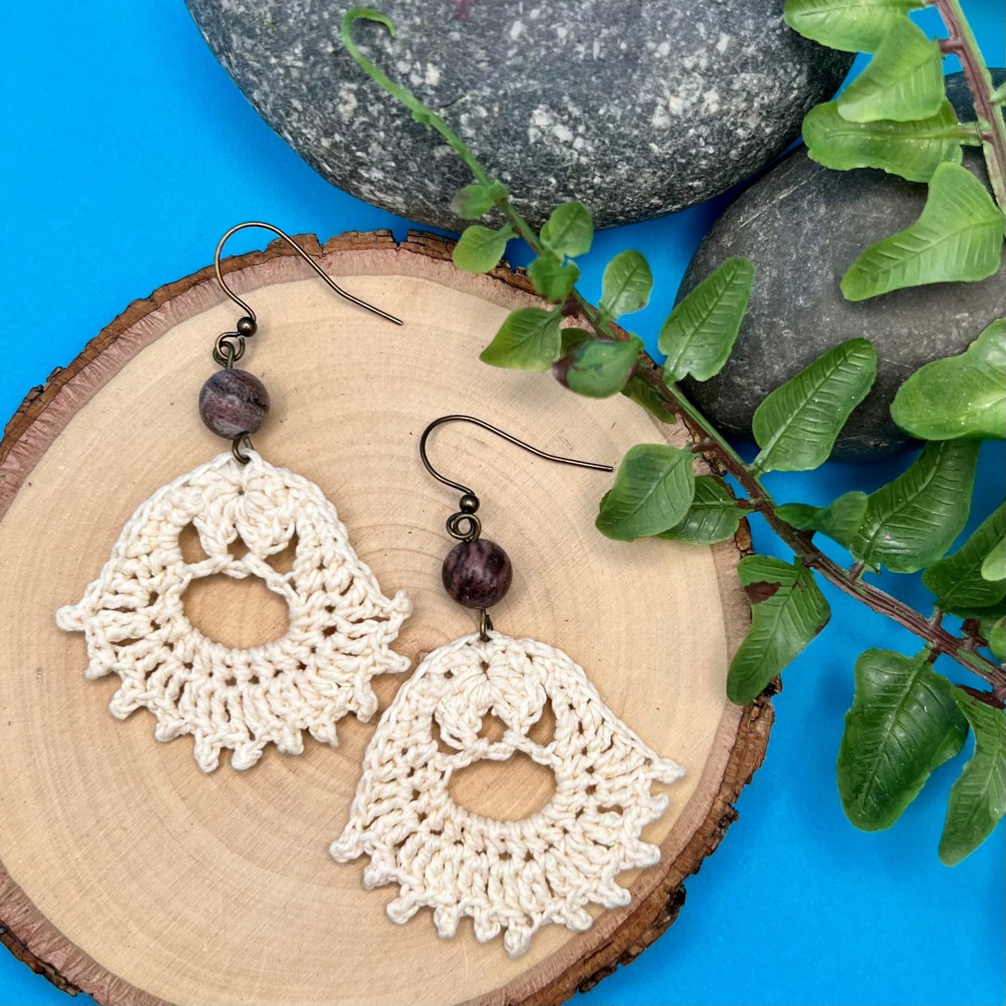 cream crocheted earrings with natural stones