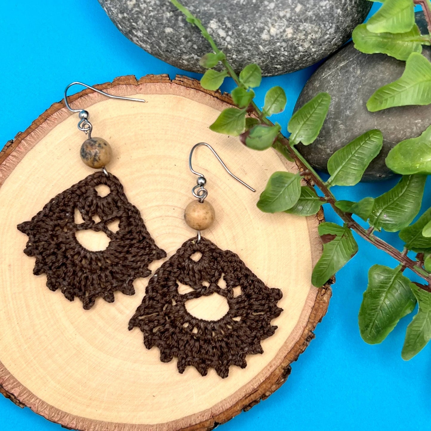 dark brown crocheted earrings with natural stones
