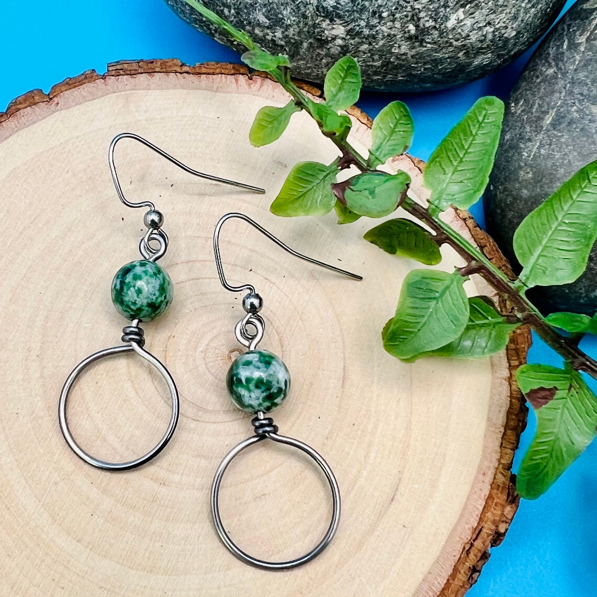steel gray dangle hoop earrings with green tree jasper