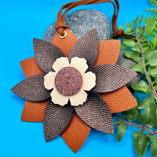 leather flower bag charm in orange and brown
