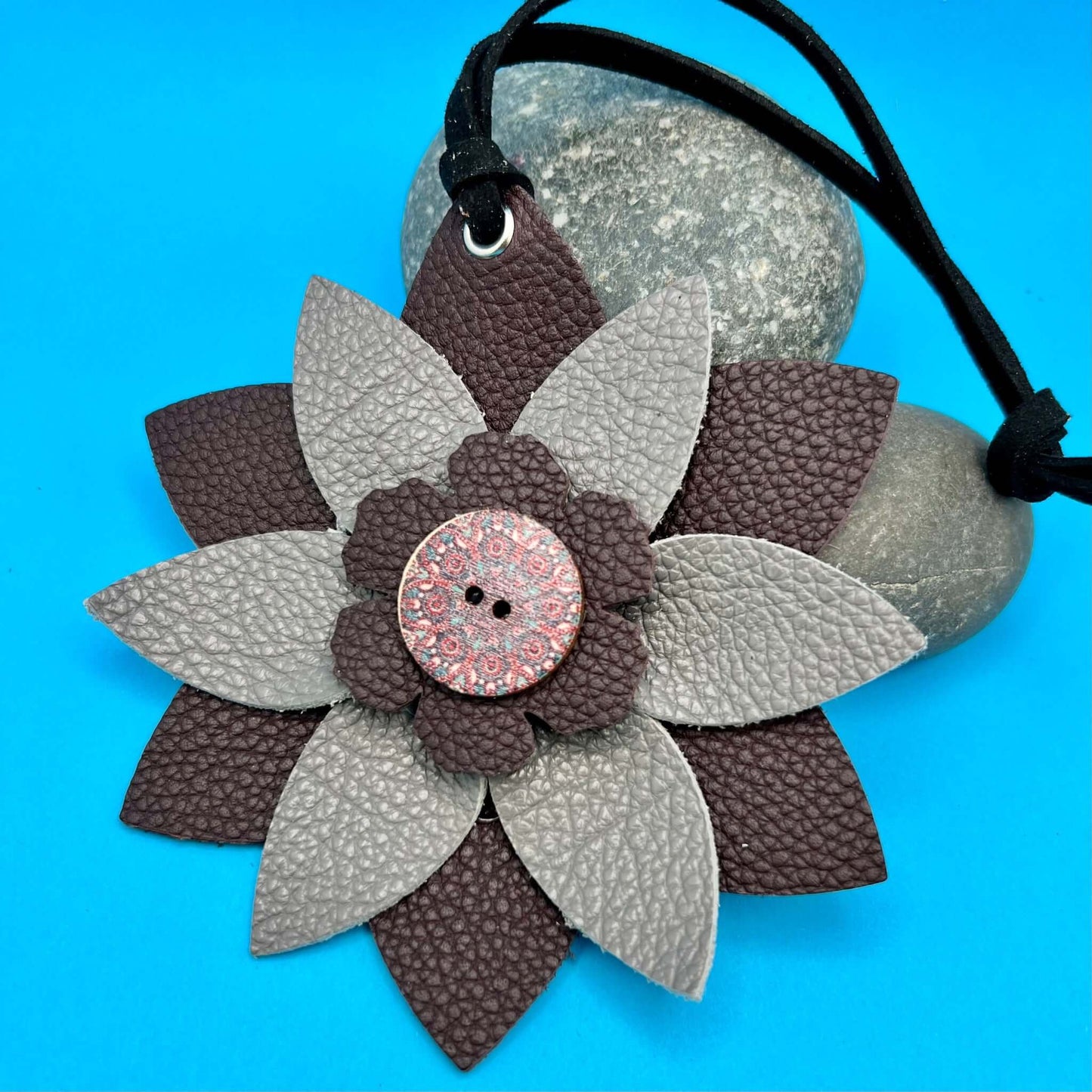 Leather Flower Purse Charms - Deluxe Flower in Gray and PurpleLimited edition leather purse charms will give any bag, handbag or tote an instant update. Each flower is hand crafted using quality genuine leather in a variety of colors and textures. Flowers