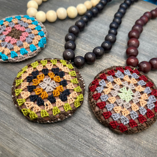 retro crocheted pendant necklace on wood bead strand