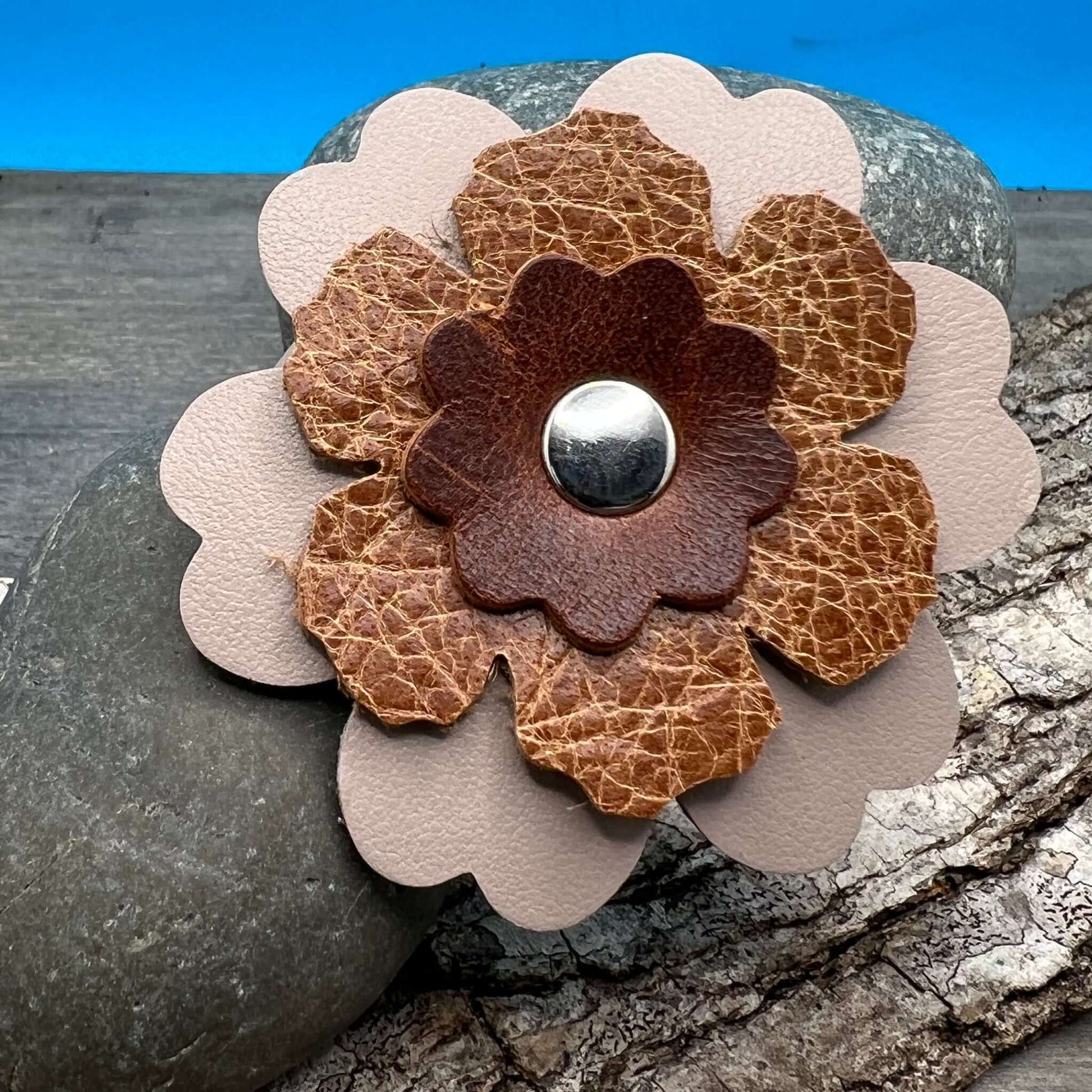 Scarf Cuff - Leather Flowers For Shawls and ScarvesHandcrafted from premium leather, this scarf cuff is a beautiful way to elevate any outfit. Featuring a colorful layered flower, it easily attaches to shawls, scarves, or handbags. Flowers are between 2.2