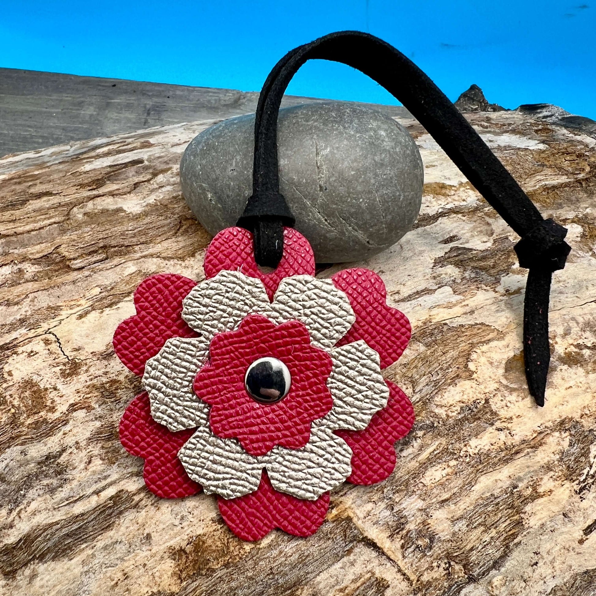 Small Leather Flower Purse Charm - Berry Pink and Rose GoldWhen you want just a little pop of color for your handbag or purse. Update an old bag or tote with a genuine leather layered flower. Add a single flower to your small cross body or layer with othe