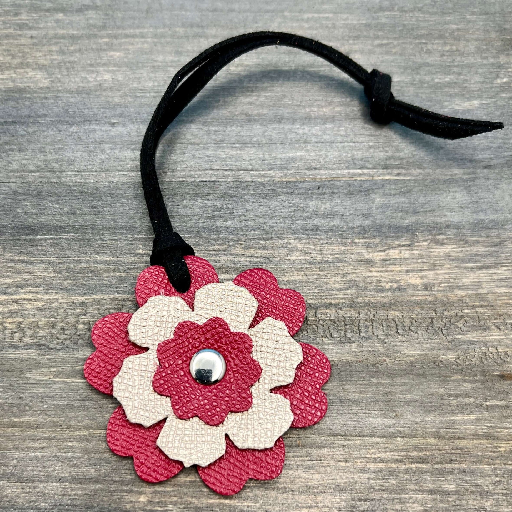 Small Leather Flower Purse Charm - Berry Pink and Rose GoldWhen you want just a little pop of color for your handbag or purse. Update an old bag or tote with a genuine leather layered flower. Add a single flower to your small cross body or layer with othe