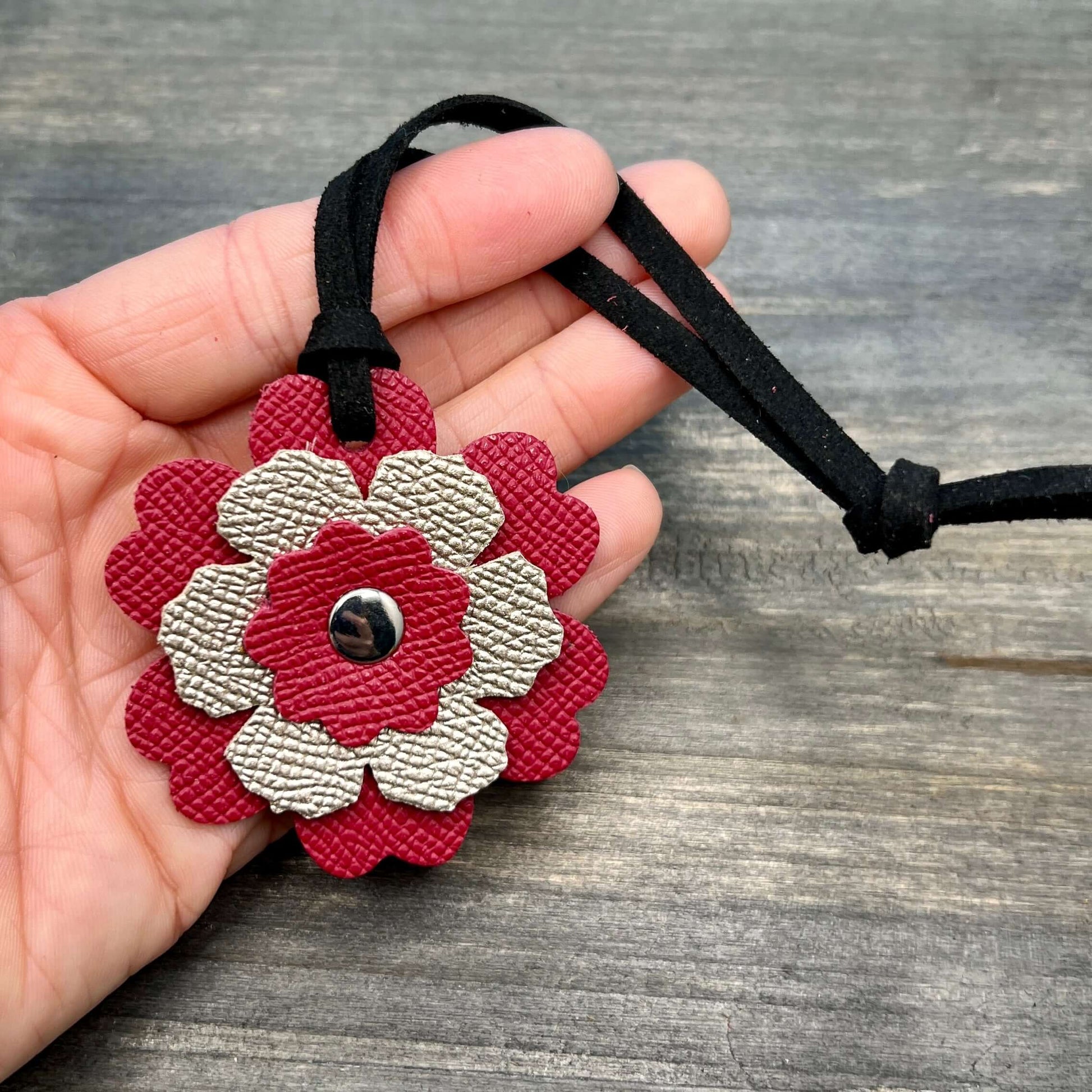 Small Leather Flower Purse Charm - Berry Pink and Rose GoldWhen you want just a little pop of color for your handbag or purse. Update an old bag or tote with a genuine leather layered flower. Add a single flower to your small cross body or layer with othe