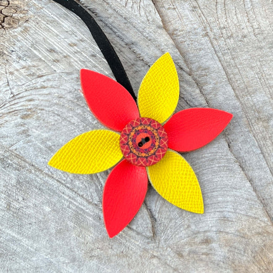 Leather Flower Bag Charm with Tote Loop in Spring BrightsBag charms are a great way to update your handbag, purse or tote. Each flower is crafted with leather petals securely sewn and glued together. Accented with metal and wood buttons. Flowers are betwe