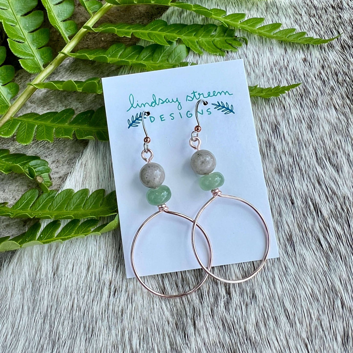 Festival Hoop Earrings - Rose Gold with Feldspar & Green AventurineLight and airy hoop earrings are the perfect compliment to your festival style. Hand formed hoops are made with tarnish resistant enameled copper wire in rose gold and accented with a pair