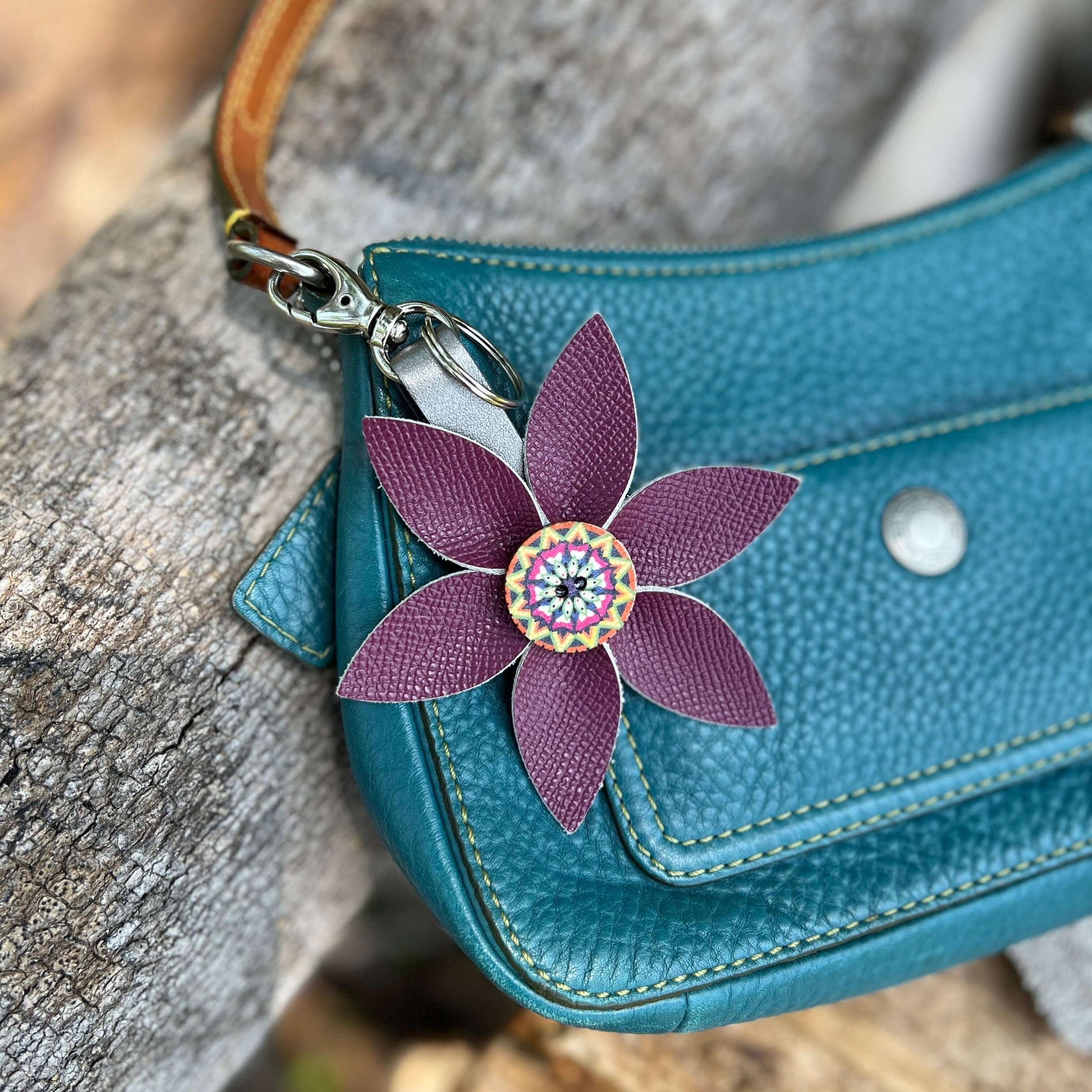 Leather Flower Bag Charm Keychain - Deep PinkLeather purse charms are a great way to update your handbag, purse or tote. Each flower is crafted with leather petals securely sewn and glued together. Colorful wooden button adds a little boho flair. Flowers