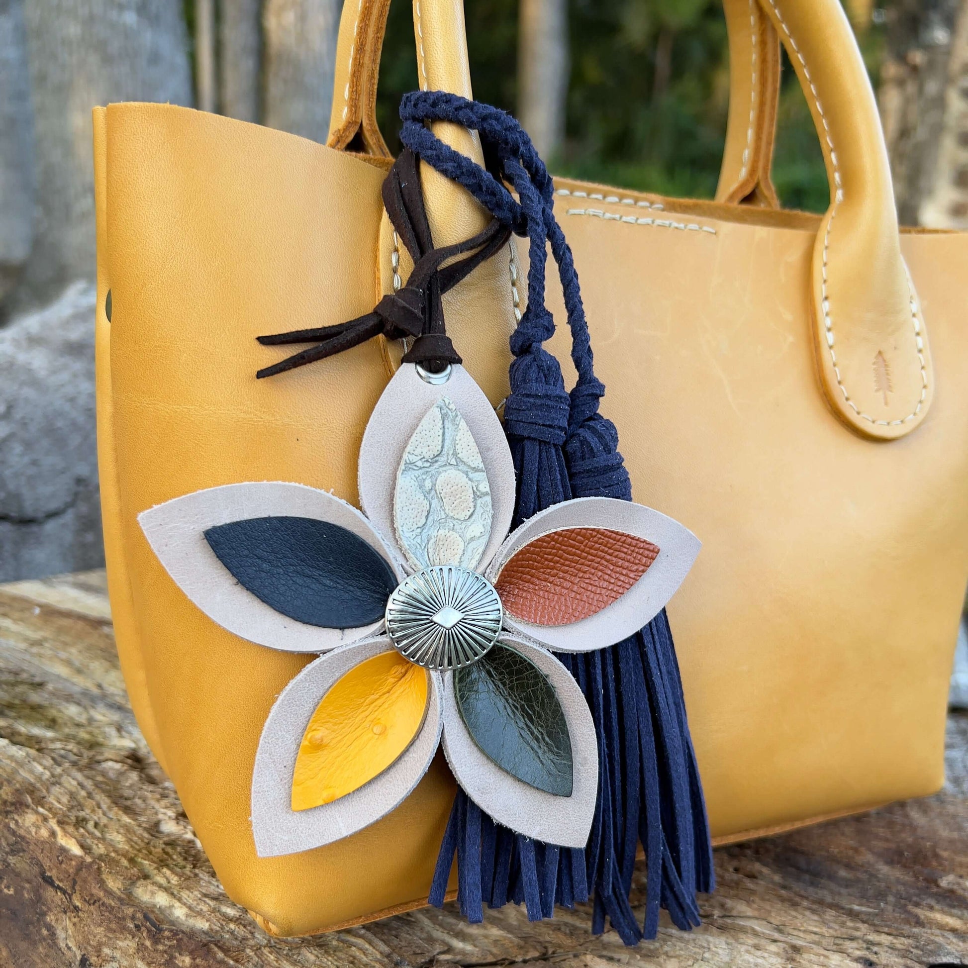 Leather Flower Bag Charm - Large Flower with Loop - Tan with Fall ColorsLeather purse charms are a great way to update your handbag, purse or tote. Each flower is crafted with leather petals securely sewn and glued together and accented with buttons in th