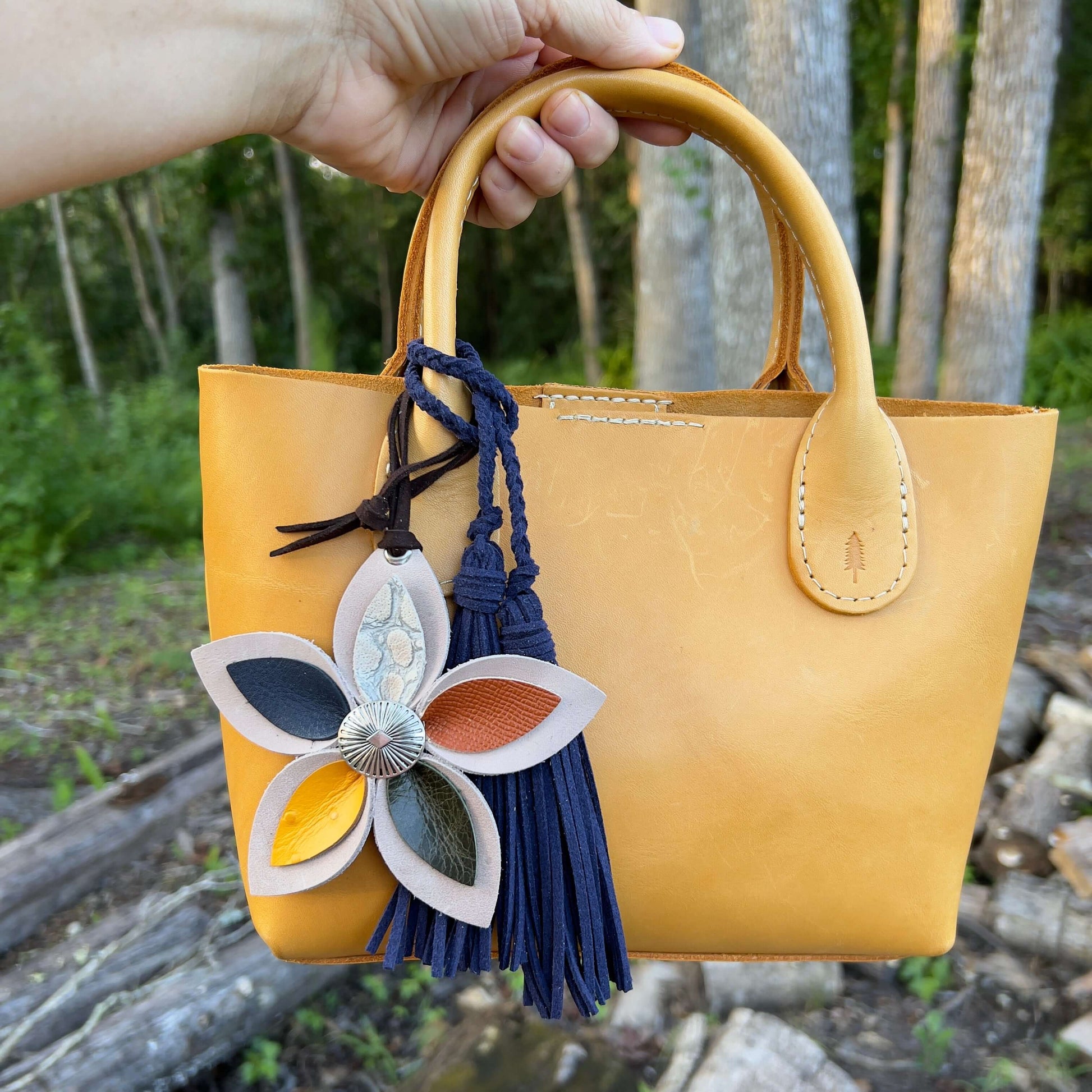 Leather Flower Bag Charm - Large Flower with Loop - Tan with Fall ColorsLeather purse charms are a great way to update your handbag, purse or tote. Each flower is crafted with leather petals securely sewn and glued together and accented with buttons in th