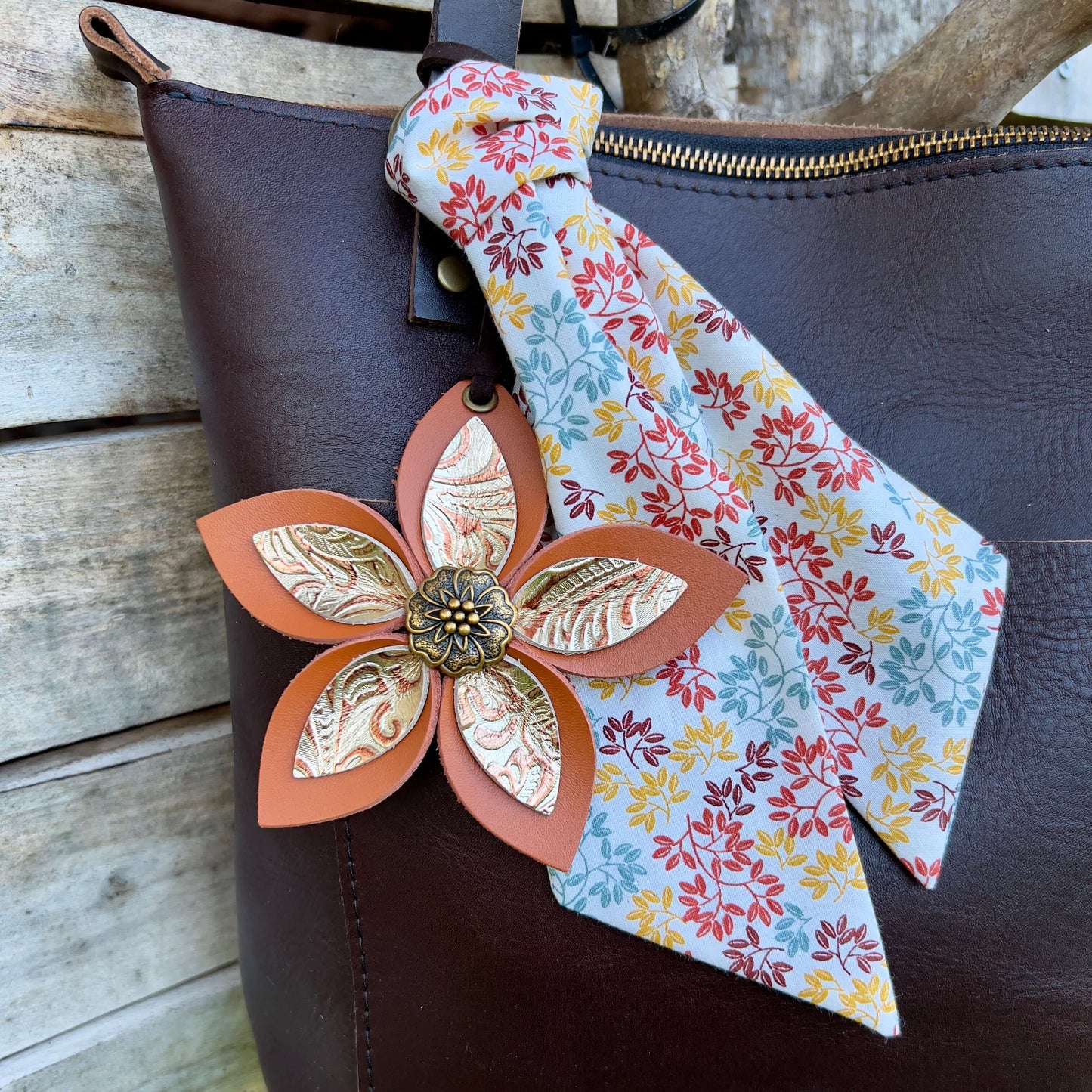 Leather Flower Bag Charm - Large Flower with Loop - Deep Orange with Golden FloralLeather purse charms are a great way to update your handbag, purse or tote. Each flower is crafted with leather petals securely sewn and glued together and accented with but