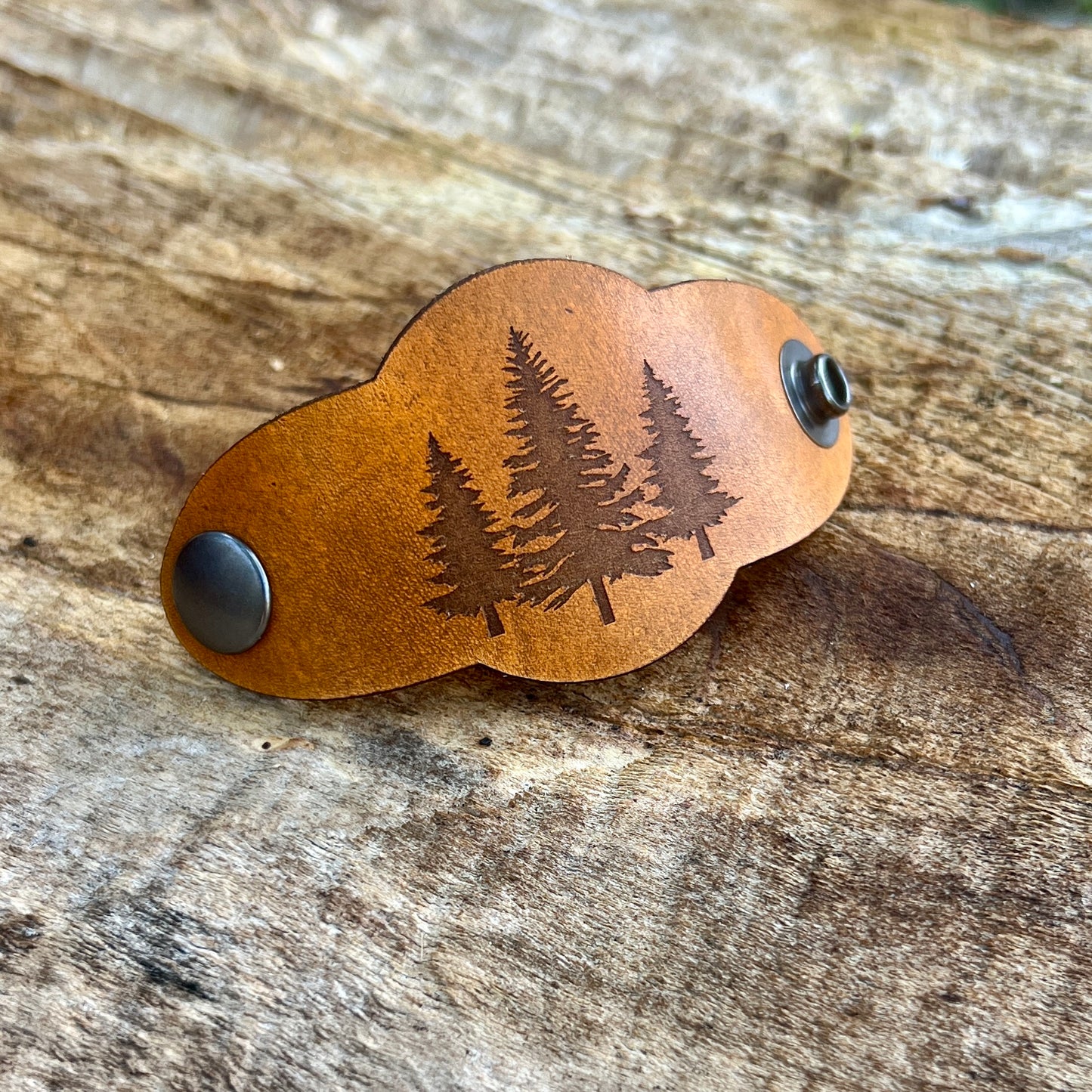 genuine leather bandana slide with trio of pine trees