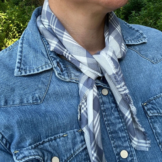 Bandana Scarf - Denim Blue PlaidElevate your style with a plaid bandana scarf. Cotton viscose fabric is soft and silky. Square bandana style with a raw fringed edge can be worn with leather slide or simply tie in a knot. Cotton/viscose fabric with raw edg