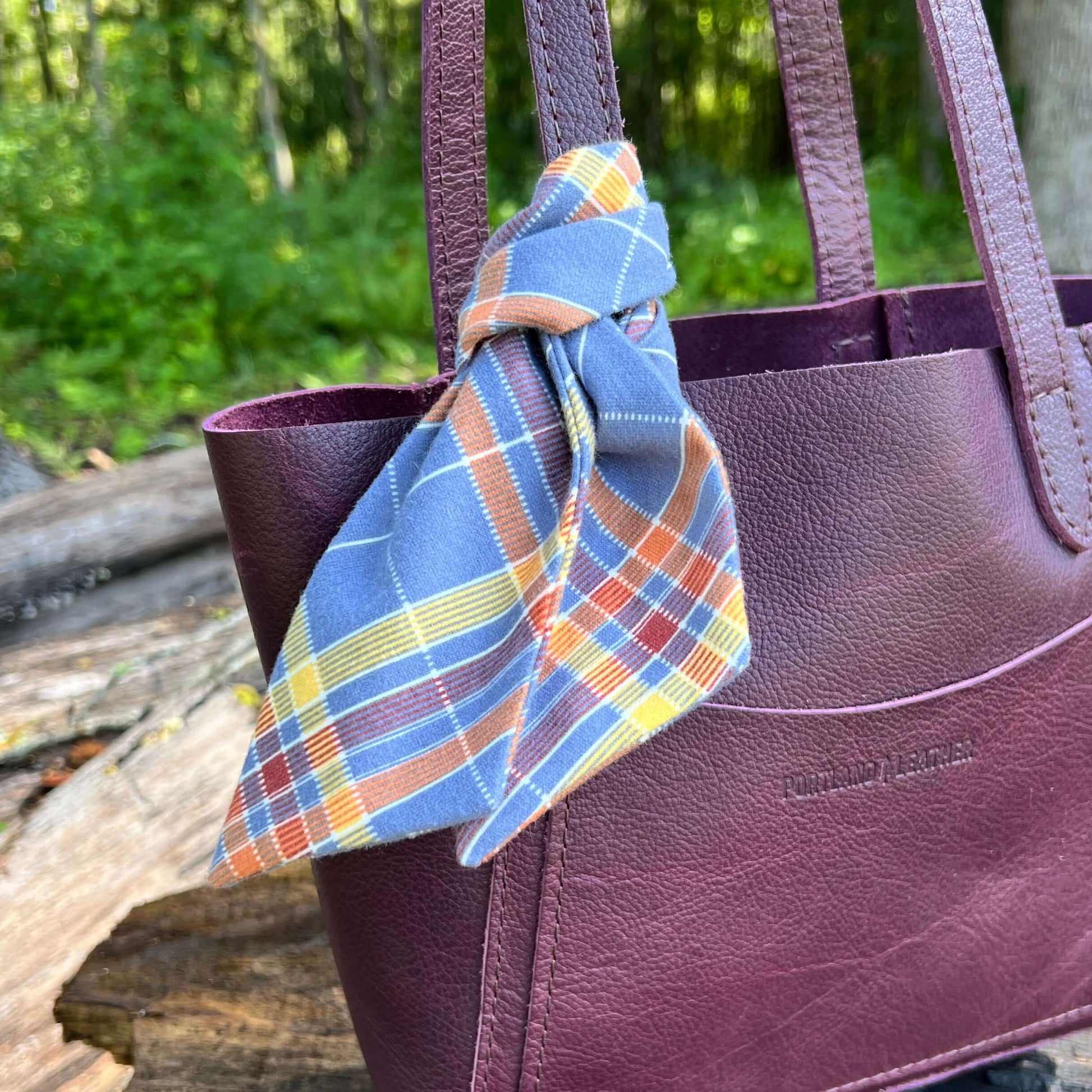 Purse Scarf - Skinny Fall Blue Plaid FlannelA little cozy for your purse, handbag or tote. Flannel purse scarf will give your bag or tote an instant Fall update. Tie it in a bow or a simple knot. Looks great with tassels or other bag charms. 2.5" wide and