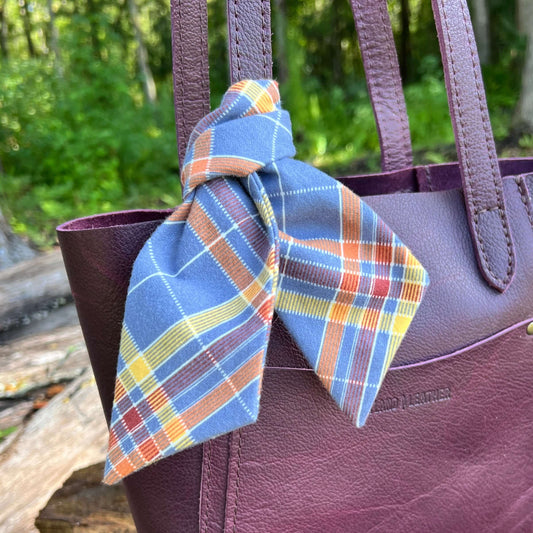 Purse Scarf - Skinny Fall Blue Plaid FlannelA little cozy for your purse, handbag or tote. Flannel purse scarf will give your bag or tote an instant Fall update. Tie it in a bow or a simple knot. Looks great with tassels or other bag charms. 2.5" wide and