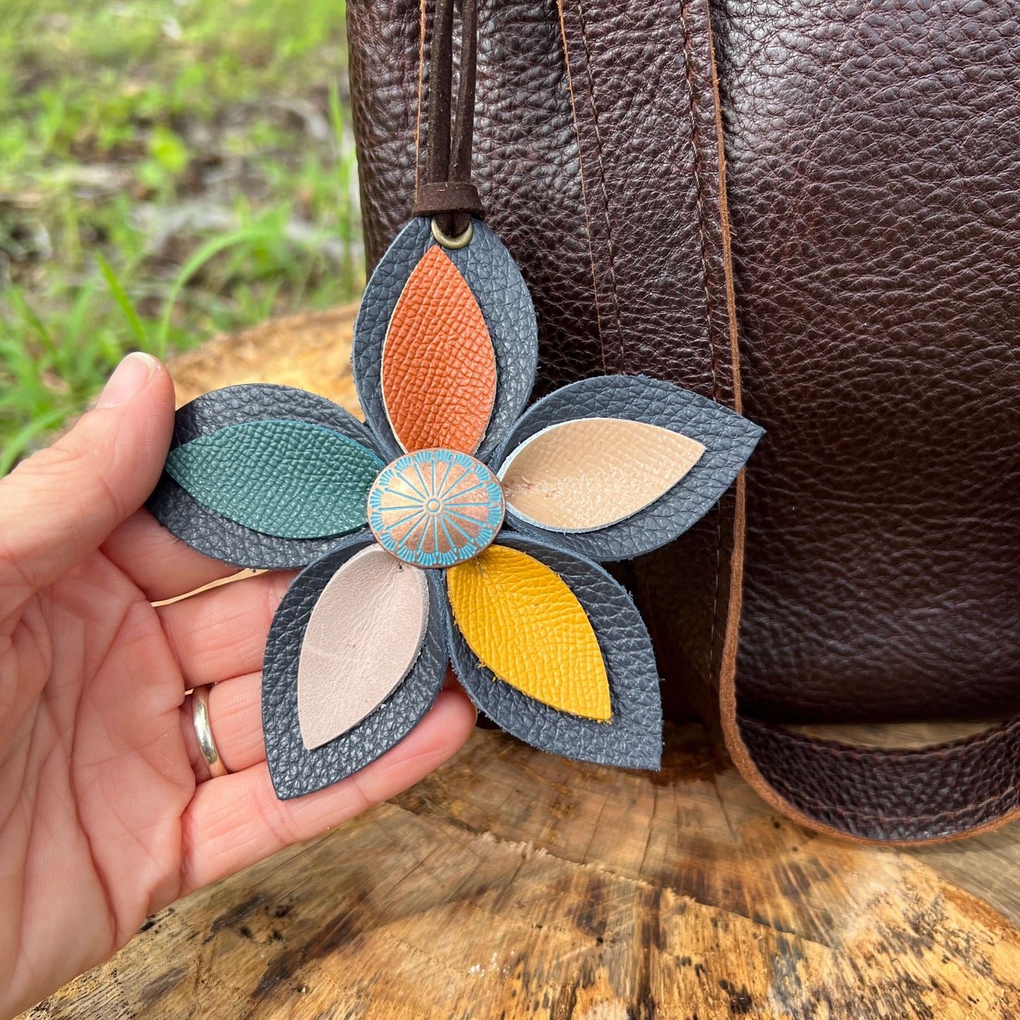 Leather Flower Bag Charm - Large Flower with Loop - Grey Blue with Assorted ColorsLeather purse charms are a great way to update your handbag, purse or tote. Each flower is crafted with leather petals securely sewn and glued together and accented with but