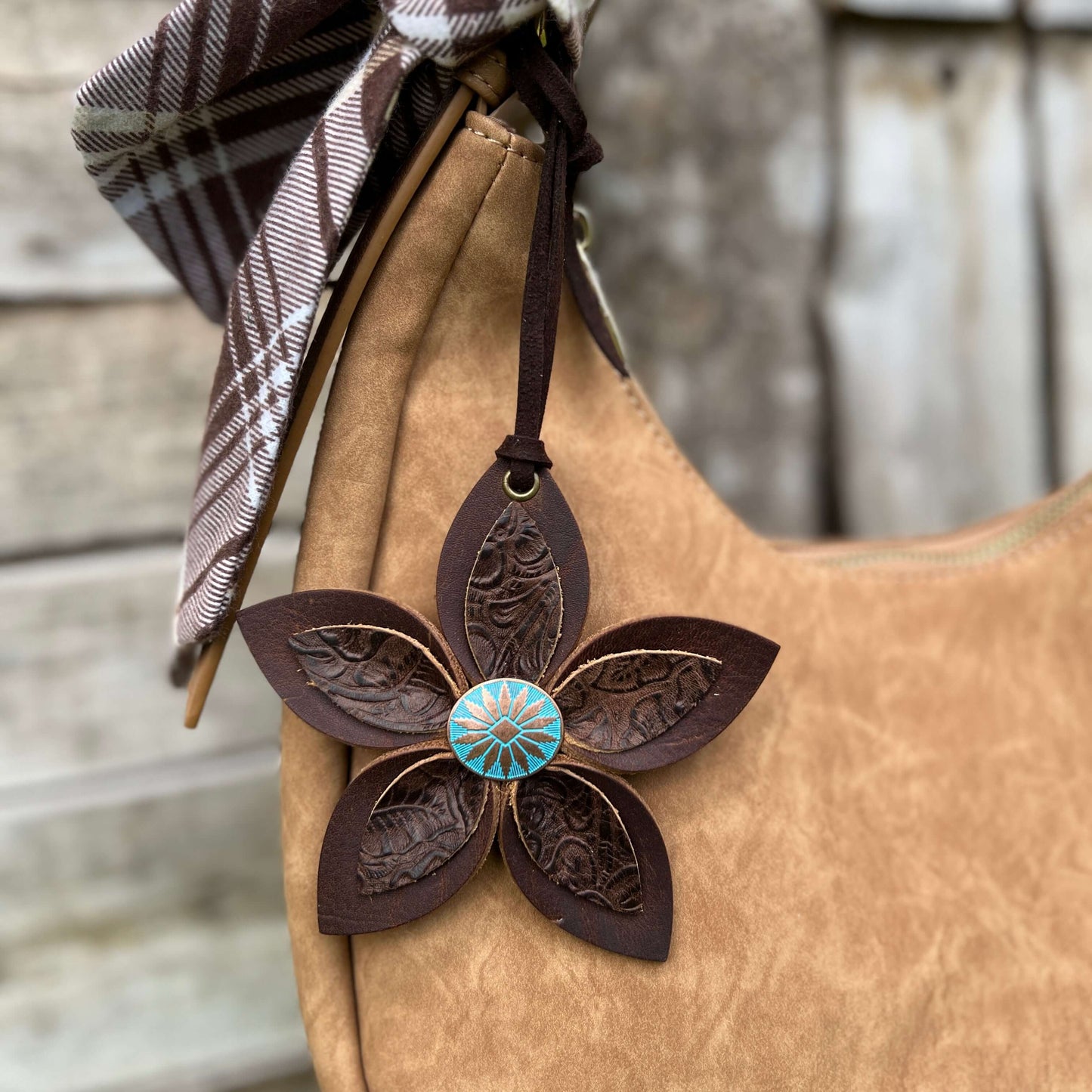 Leather Flower Bag Charm - Large Flower with Loop - Western BrownLeather purse charms are a great way to update your handbag, purse or tote. Each flower is crafted with leather petals securely sewn and glued together and accented with buttons in the cente