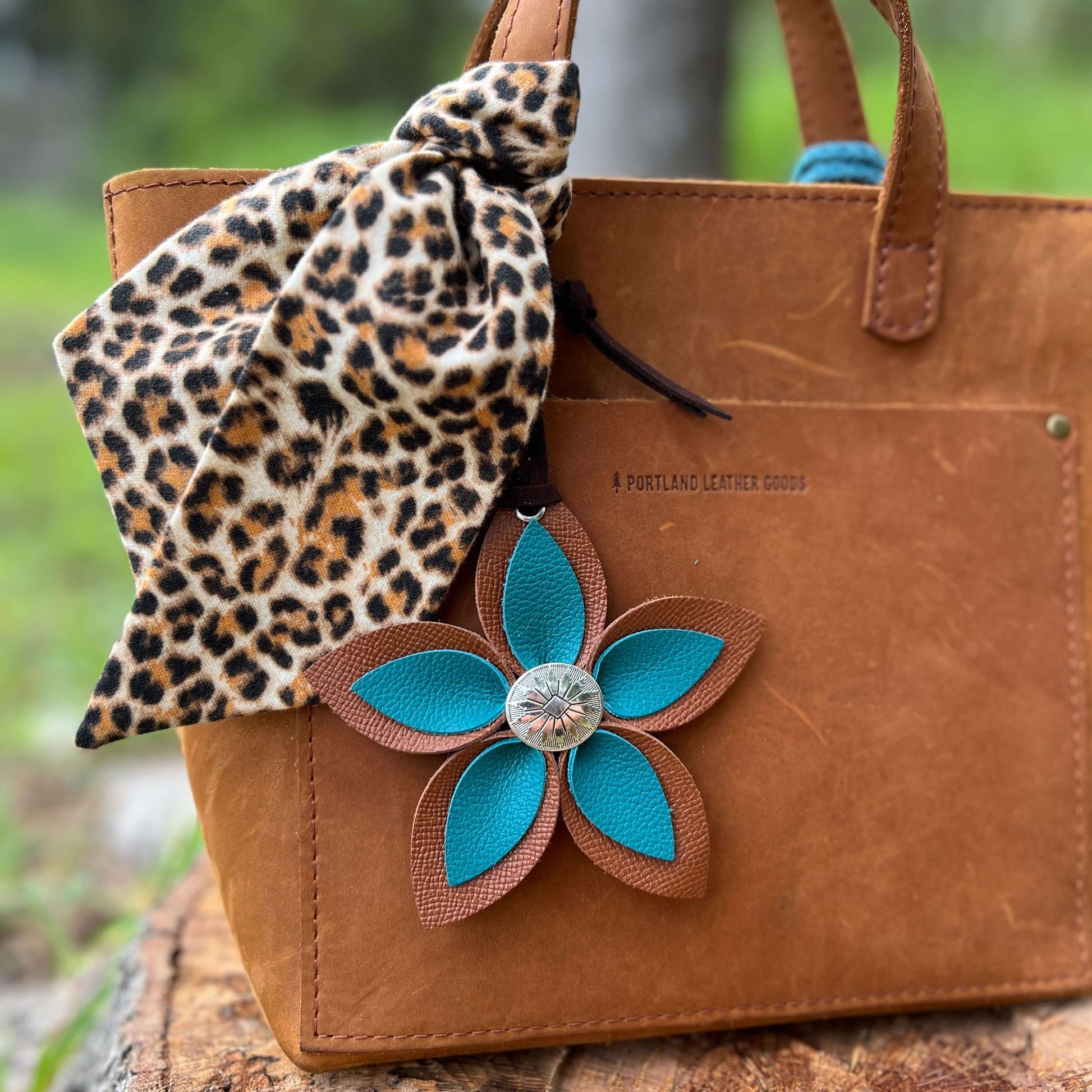 Leather Flower Bag Charm - Large Flower with Loop - Teal and BrownLeather purse charms are a great way to update your handbag, purse or tote. Each flower is crafted with leather petals securely sewn and glued together and accented with buttons in the cent