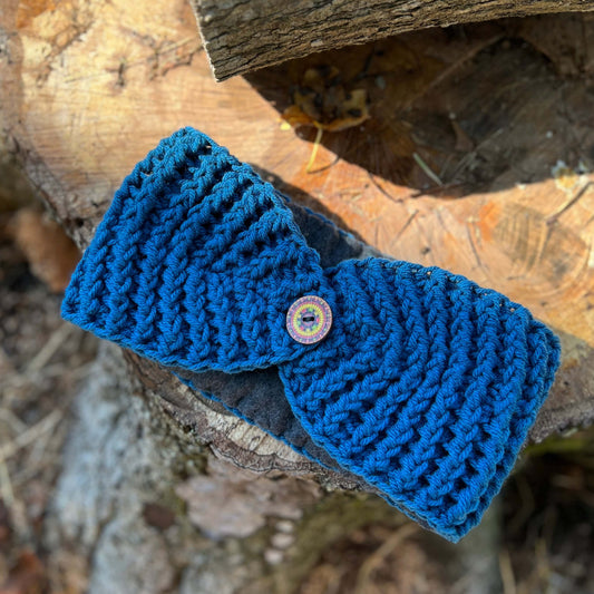 Winter Headband with Fleece Lining - Bright BlueKeep your ears nice and warm without messing up your do. Crocheted with super soft acrylic yarn and lined with fleece for extra warmth. Button can be worn in the back, front or on the side. 4.75" wide - extr