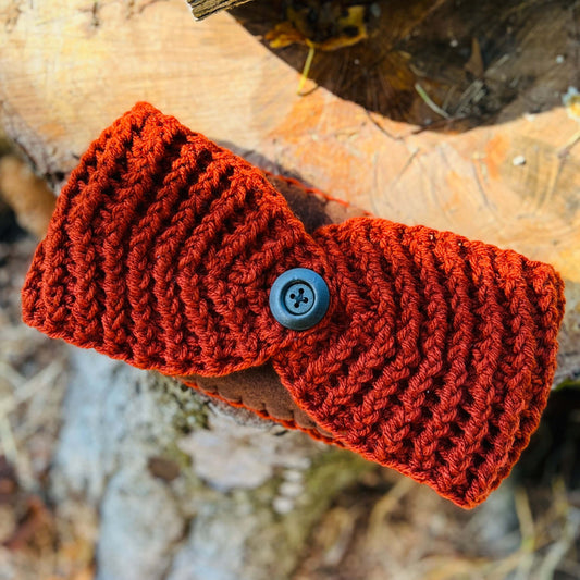 Winter Headband with Fleece Lining - CinnamonKeep your ears nice and warm without messing up your do. Crocheted with super soft acrylic yarn and lined with fleece for extra warmth. Button can be worn in the back, front or on the side. 4.75" wide - extra w