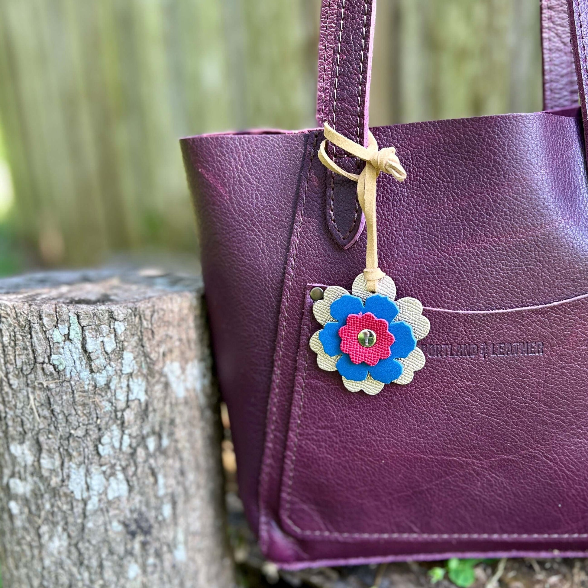 Small Leather Flower Purse Charm - Rose Gold, Blue and PinkWhen you want just a little pop of color for your handbag or purse. Update an old bag or tote with a genuine leather layered flower. Add a single flower to your small cross body or layer with othe