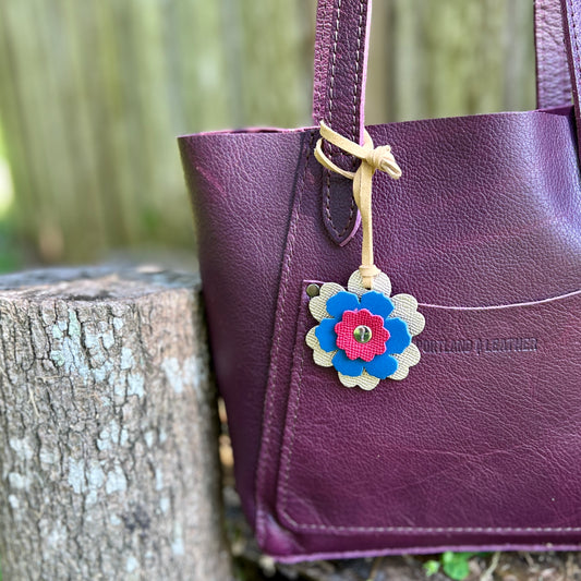 pink and blue small leather flower bag charm on purse