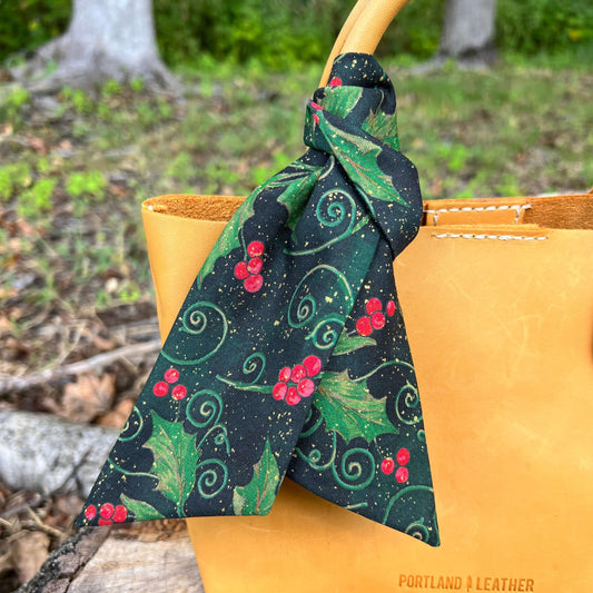 Christmas Flower and Scarf Bag CharmGive your handbag, purse or tote a bit of Christmas cheer with a festive purse scarf or leather flower charm. Cotton scarf in a holiday holly print look great alone or add a small leather flower in red, green and white.