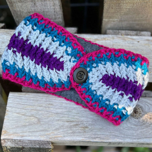 Winter Headband with Fleece Lining - Bright StripesKeep your ears nice and warm without messing up your do. Crocheted with super soft acrylic yarn and lined with fleece for extra warmth. Button can be worn in the back, front or on the side. 4.75" wide - e